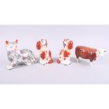 A Beswick model of a champion bull, a pair of Staffordshire spaniels and a Chinese porcelain famille