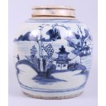 A Chinese provincial ginger jar and cover with landscape decoration, 8" high