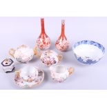 A Chinese blue and white bowl, a pair of Japanese sprinkler bottles, a Japanese teaset and a pot-