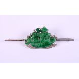 An Art Deco white metal, jade and diamond bar brooch, formed as a junk, 2 1/2" long