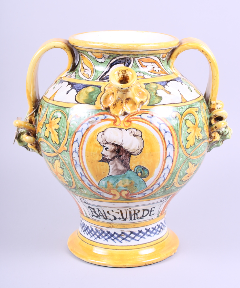 A mid 20th century Majolica two-handled wet drug jar with yellow and green glaze