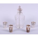 A pair of miniature silver mounted horn beakers, a pair of Continental 800 grade white metal