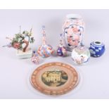 Three Imari sprinkler bottles, two ginger jars, an Imari vase and other decorative items