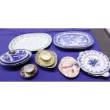 A Willow pattern platter, a similar tureen, three other platters, Wedgwood creamware and other
