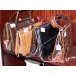Two lady's leather handbags with three other skin handbags