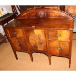 A Georgian mahogany ledge back sideboard fitted single cupboard and four drawers, on square