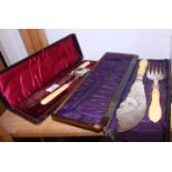A pair of Aesthetic design silver plated fish servers with ivory handles, in fitted case, and