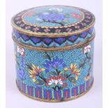 A 19th century cloisonne circular box and cover, decorated flowers, 3 3/4" high
