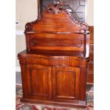 A Victorian mahogany chiffonier with carved top and frieze drawer, on barley twist supports and