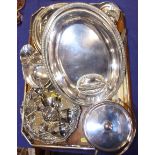 Two silver plated entree dishes, six egg cups, a biscuit barrel, a candlestick, cutlery and other
