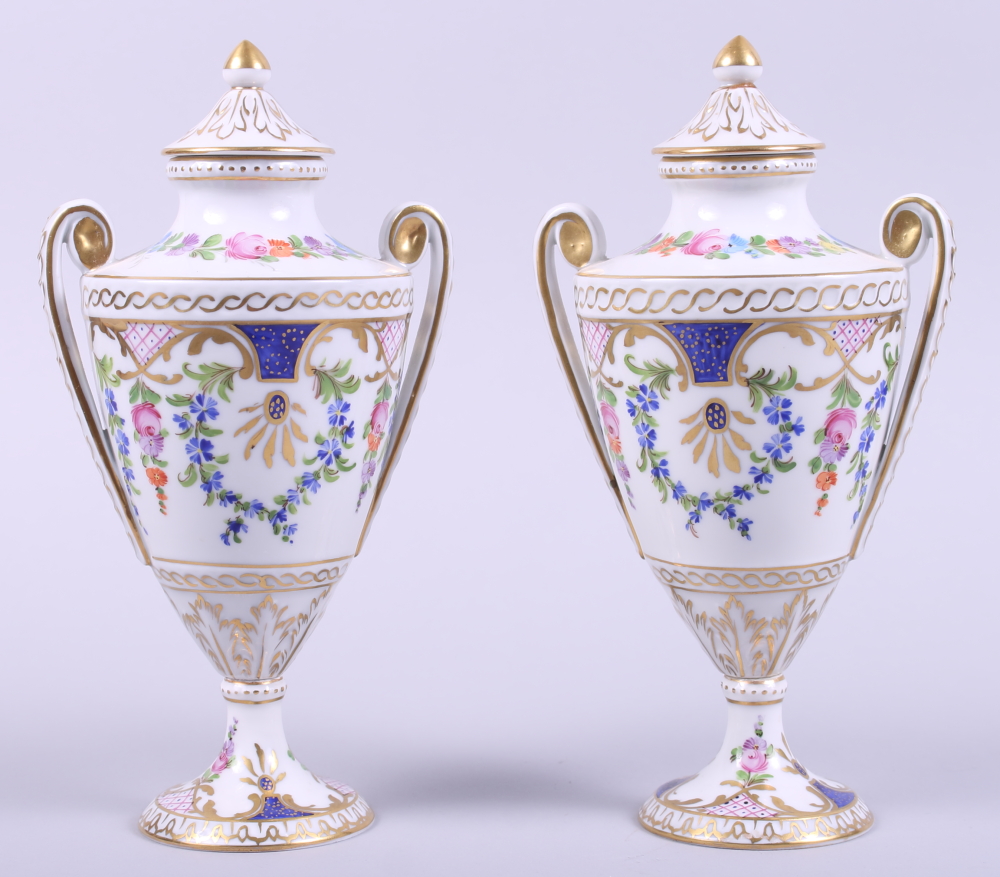 A pair of Dresden porcelain two-handled urns and covers with gilt and floral decoration, 8 1/2"