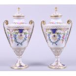 A pair of Dresden porcelain two-handled urns and covers with gilt and floral decoration, 8 1/2"