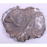 An Art Nouveau design white metal tray with embossed decoration of a woman and foliage