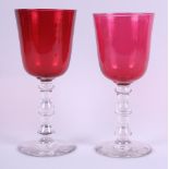 A pair of hand-blown cranberry goblets, 9" high and 8 3/4" high