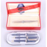 A Lady Sheaffer fountain pen, in fitted case, and a pen and pencil set, in fitted case