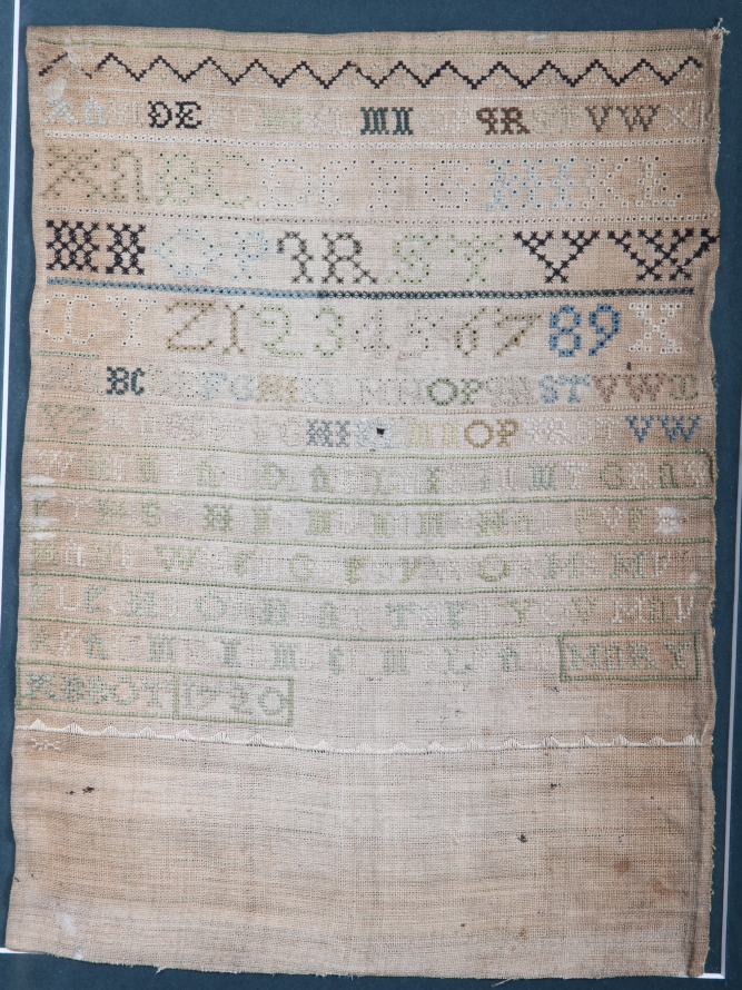 An 18th century needlepoint sampler, by Mary Abbot, dated 1720, 11" x 8", in maple frame