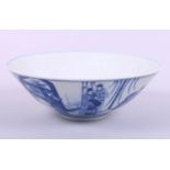 A 19th century Chinese blue and white porcelain shallow dish, decorated figures in a landscape,