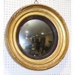 A 19th century gilt framed circular convex mirror, 11" dia