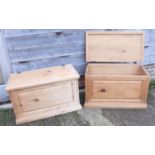 A pair of pine chests with black metal fittings, on plinth bases, 35 1/2" wide