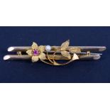 A 15ct gold, ruby and seed pearl bar brooch, 2.7g