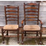 A set of five oak ladder back chairs with rush envelope seats (4+1)