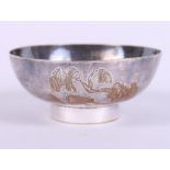 A Japanese white metal and parcel-gilt bowl, 2.4oz troy approx
