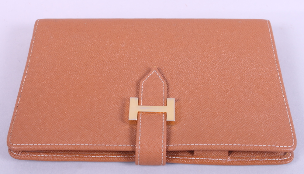 An Hermes brown "leather" Filofax cover