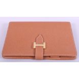 An Hermes brown "leather" Filofax cover