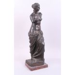 A bronze statue of the Venus de Milo, on marble base, 20" high overall