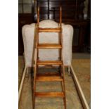 A Simplex stripped pine and iron mounted five-step folding library ladder, 53 1/2" high