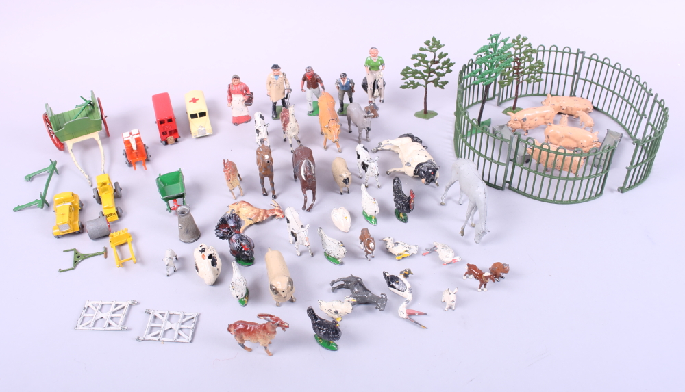 A selection of Britains painted lead farm animals and various other toys