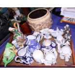A Bretby jardiniere, decorated dragons, a Carlton ware sauce boat, assorted jugs and other items