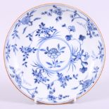 A Kangxi blue and white floral decorated saucer dish, 8 1/2" dia