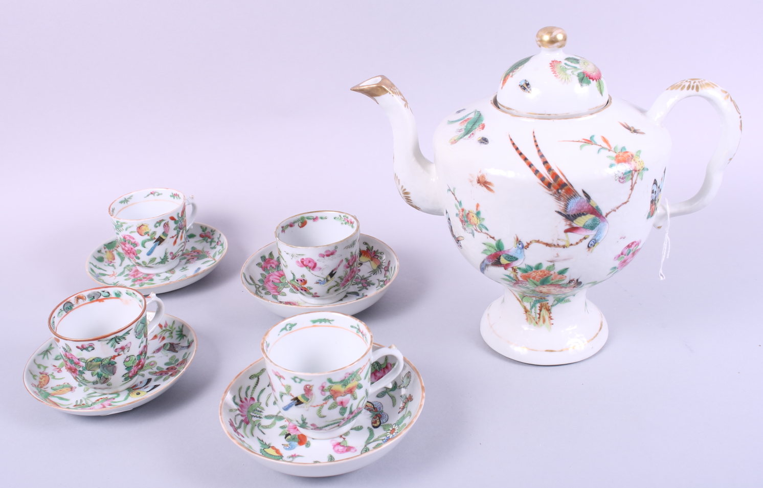 A Chinese famille verte matched teaset, decorated flowers, birds and insects (ten pieces)