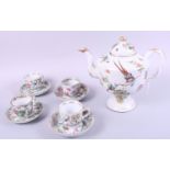 A Chinese famille verte matched teaset, decorated flowers, birds and insects (ten pieces)