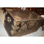 A 19th century Zanzibar type chest with hinged lid over three drawers with brass fittings and