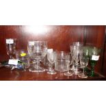 A 19th century cut glass goblet, a green glass wine and other cut table glass