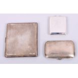 Two silver cigarette cases and a silver match book cover, 7.2oz troy approx