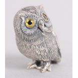 A white metal pin cushion, in the form of an owl, stamped sterling, 7" high