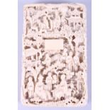 A 19th century Canton ivory card case, decorated figures, buildings and trees, 4 1/4" long (