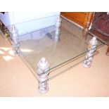 An Indian embossed and enamelled white metal mounted glass two-tier coffee table, 42" square x 19"