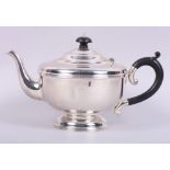 A silver teapot with ebonised knop and handle, 14.3oz troy approx