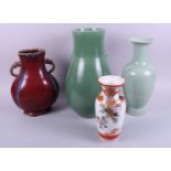 A Chinese sang de boeuf two-handled vase, 11 1/2" high, two celadon glazed vases and a Japanese