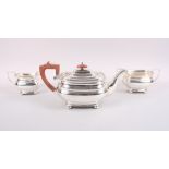 A silver three-piece teaset with gadrooned borders, by Payne & Sons Oxford, 38.9oz troy approx