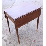 A mahogany Pembroke table, fitted one drawer, on square tapered supports, 27 1/2" wide, and a