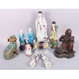 A Chinese pottery Kylin, 8 1/4" high, various Chinese figures and a composite seated figure