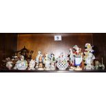 Three pairs of German porcelain figures, two Royal Doulton figures, "Autumn Breezes" and "