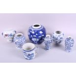 A 19th century Chinese mug, decorated boats, trees and houses, 4" high, two blue and white oviform