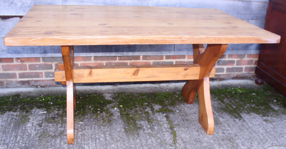 A pine refectory table, on 'X' frame support, and a pine bench, on panel end supports, each 60"