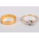 A 22ct gold wedding band, ring size M, 2.9g, and a yellow metal crossover ring set two diamond